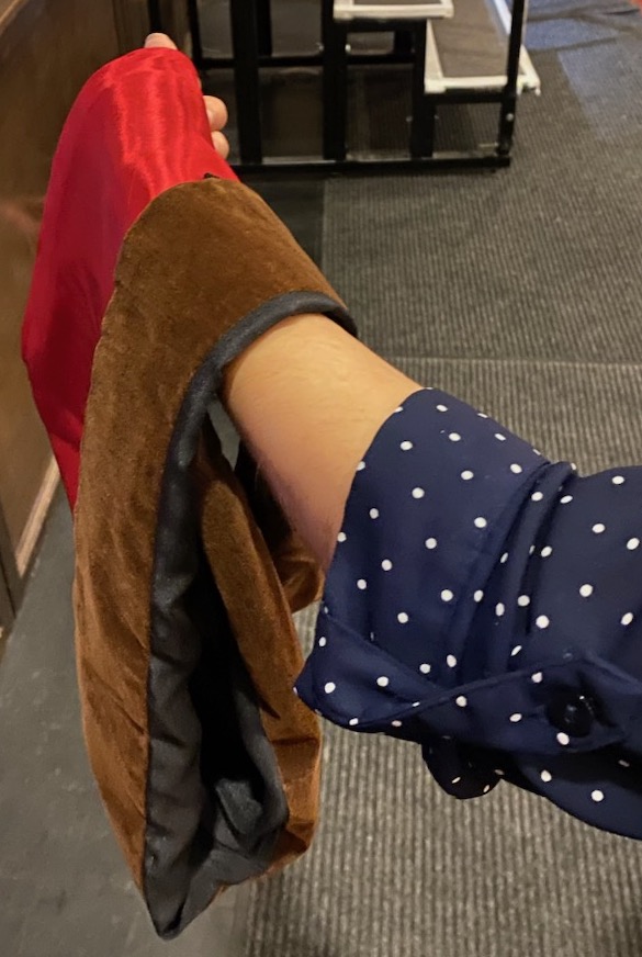 Holding terminal degree hood from the back