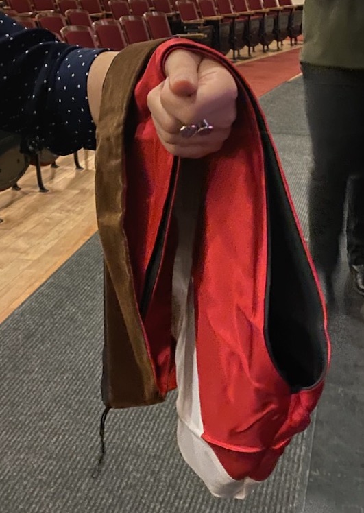 Holding hood from the front